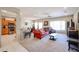 Spacious living room with comfortable seating and views to kitchen at 16222 W Talara Way, Surprise, AZ 85374
