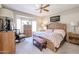 Bright main bedroom with bay window and ensuite bath at 16222 W Talara Way, Surprise, AZ 85374