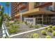 Building entrance with landscaping and signage at 4750 N Central Ave # 8B, Phoenix, AZ 85012