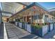 Outdoor patio seating area with lush landscaping and inviting atmosphere at 4750 N Central Ave # 8B, Phoenix, AZ 85012