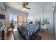 Spacious bedroom with a queen-size bed and access to a balcony at 4750 N Central Ave # 8B, Phoenix, AZ 85012
