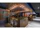 Outdoor patio area with string lights and comfortable seating at 4750 N Central Ave # 8B, Phoenix, AZ 85012