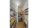 Well-organized pantry with ample shelving for storage at 4750 N Central Ave # 8B, Phoenix, AZ 85012