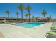 Sparkling community pool surrounded by lush landscaping at 4750 N Central Ave # 8B, Phoenix, AZ 85012