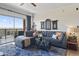Spacious living area featuring a sectional sofa and city views at 4750 N Central Ave # 8B, Phoenix, AZ 85012