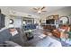 Bright living room with comfy seating and a view of the kitchen at 4750 N Central Ave # 8B, Phoenix, AZ 85012
