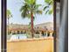 Balcony view of a community pool and surrounding buildings at 16336 E Palisades Blvd # 9, Fountain Hills, AZ 85268