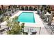 Inviting community pool with surrounding patio furniture at 16336 E Palisades Blvd # 9, Fountain Hills, AZ 85268