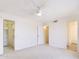 Spacious bedroom with mirrored closet doors and access to bathroom at 16336 E Palisades Blvd # 9, Fountain Hills, AZ 85268