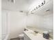 Clean bathroom with single sink vanity, tub, and shower at 16336 E Palisades Blvd # 9, Fountain Hills, AZ 85268