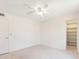 Spacious bedroom with ceiling fan, carpet, and walk-in closet at 16336 E Palisades Blvd # 9, Fountain Hills, AZ 85268