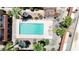 Aerial view of community pool and surrounding landscape at 16336 E Palisades Blvd # 9, Fountain Hills, AZ 85268