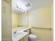 Well-lit bathroom with a single sink and grab bar at 16336 E Palisades Blvd # 9, Fountain Hills, AZ 85268