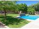 Refreshing pool surrounded by lush greenery at 10220 E Cochise Dr, Scottsdale, AZ 85258