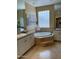 Spa-like Primary bathroom with soaking tub and double vanity at 10220 E Cochise Dr, Scottsdale, AZ 85258