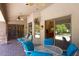 Outdoor patio with seating and pool view at 10220 E Cochise Dr, Scottsdale, AZ 85258