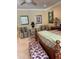 Primary bedroom with large bed, seating area, and access to bathroom at 10220 E Cochise Dr, Scottsdale, AZ 85258