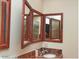 Bathroom with a unique wooden medicine cabinet at 600 N Mariposa Dr, Wickenburg, AZ 85390