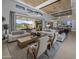 Open living space featuring a large sectional sofa and a view of the backyard at 24046 N 126Th Pl, Scottsdale, AZ 85255