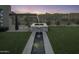 Modern water feature with a tranquil setting at 24046 N 126Th Pl, Scottsdale, AZ 85255