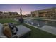 Stunning pool with built-in seating and loungers at 24046 N 126Th Pl, Scottsdale, AZ 85255