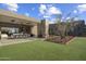 Outdoor dining patio with built-in seating and stunning backyard views at 24046 N 126Th Pl, Scottsdale, AZ 85255