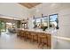 Modern kitchen with white cabinets, a large island, and stainless steel appliances at 24046 N 126Th Pl, Scottsdale, AZ 85255