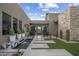 Elegant entryway with water feature and stone accents at 24046 N 126Th Pl, Scottsdale, AZ 85255