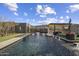 Stunning pool and spa with a built in outdoor kitchen and entertainment area at 24046 N 126Th Pl, Scottsdale, AZ 85255