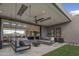 Covered patio with comfortable swing seating and views at 24046 N 126Th Pl, Scottsdale, AZ 85255