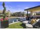 Luxury pool and patio with comfortable lounge chairs and mountain views at 24046 N 126Th Pl, Scottsdale, AZ 85255