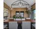 Elegant dining room showcasing a stunning live-edge table and modern lighting at 24046 N 126Th Pl, Scottsdale, AZ 85255
