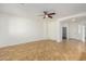 Bright living room with tile floors and ceiling fan at 7333 W Donner Dr, Laveen, AZ 85339