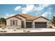 Two-story home with tile roof and two-car garage at 20262 W Hollyhock St, Buckeye, AZ 85396