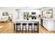 Modern kitchen with white cabinets, stainless steel appliances, and an island at 3233 S Lebanon Ln, Tempe, AZ 85282