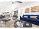 Bright and airy living room featuring a comfortable sofa and stylish decor at 3233 S Lebanon Ln, Tempe, AZ 85282