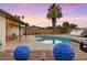 Inviting backyard oasis featuring a sparkling pool and grilling station at 3233 S Lebanon Ln, Tempe, AZ 85282