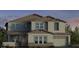 Two-story home with stone accents, large windows, and a two car garage at 5727 N 84Th Dr, Glendale, AZ 85305