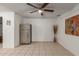 Kitchen and dining area with tile floor and ceiling fan at 2226 N 61St Ave, Phoenix, AZ 85035