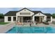 Luxury home with a large backyard, pool, and outdoor kitchen at 2659 E Maplewood St, Gilbert, AZ 85297