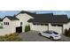 Three-car garage with paved driveway and a Tesla at 2659 E Maplewood St, Gilbert, AZ 85297
