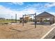 Community playground with swings, shade structures, and play area at 2659 E Maplewood St, Gilbert, AZ 85297