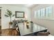 Elegant dining room with dark wood table and ornate mirror at 1408 W 7Th St, Tempe, AZ 85281