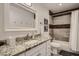 Bathroom with granite countertop and brown tile shower at 1408 W 7Th St, Tempe, AZ 85281