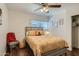 Cozy bedroom with light beige bedding and wood floors at 1408 W 7Th St, Tempe, AZ 85281