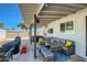 Outdoor patio area with seating, hot tub, and dining table at 1408 W 7Th St, Tempe, AZ 85281