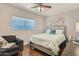 Light teal bedding in bedroom with wood floors at 1408 W 7Th St, Tempe, AZ 85281