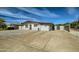 Single story home with gravel driveway and small front yard at 1408 W 7Th St, Tempe, AZ 85281