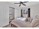Bedroom with queen bed, large closet, and window at 3406 E Libby St, Phoenix, AZ 85032