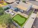 Aerial view showing home, putting green, and backyard at 3406 E Libby St, Phoenix, AZ 85032